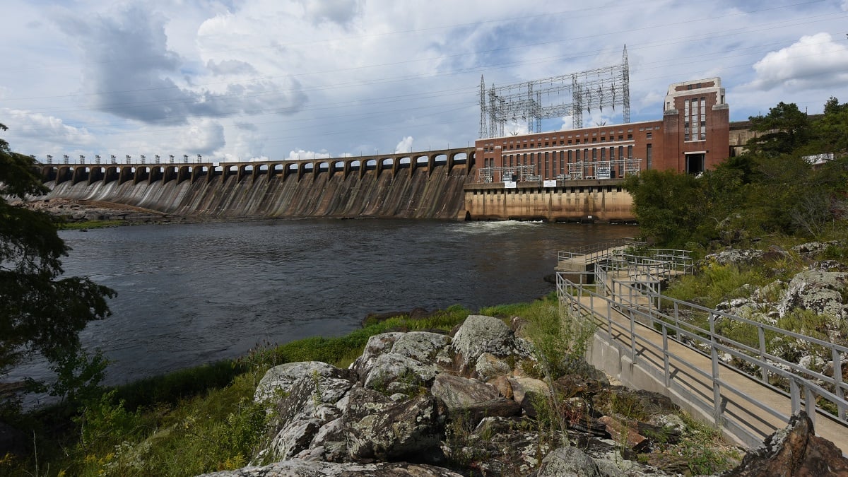 A large hydroelectric dam controlling the flow of water in a river.